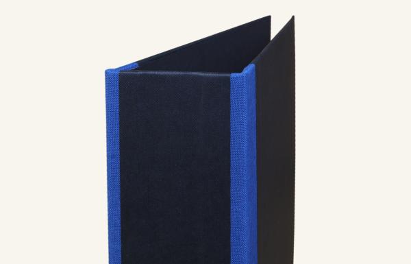 black folder with blue linen edges